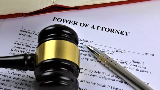 Power of Attorney with gavel and pen