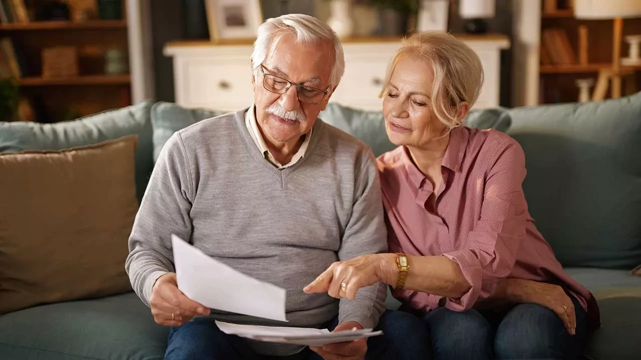 Older couple reviewing documents